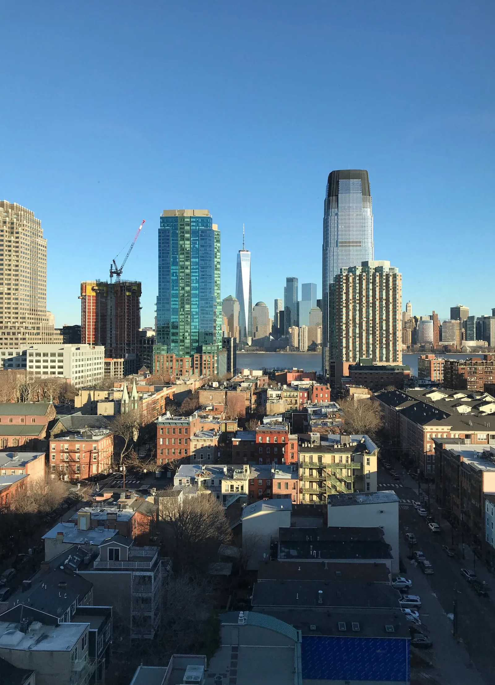 Jersey City residential buildings and skyline with Manhattan in the background